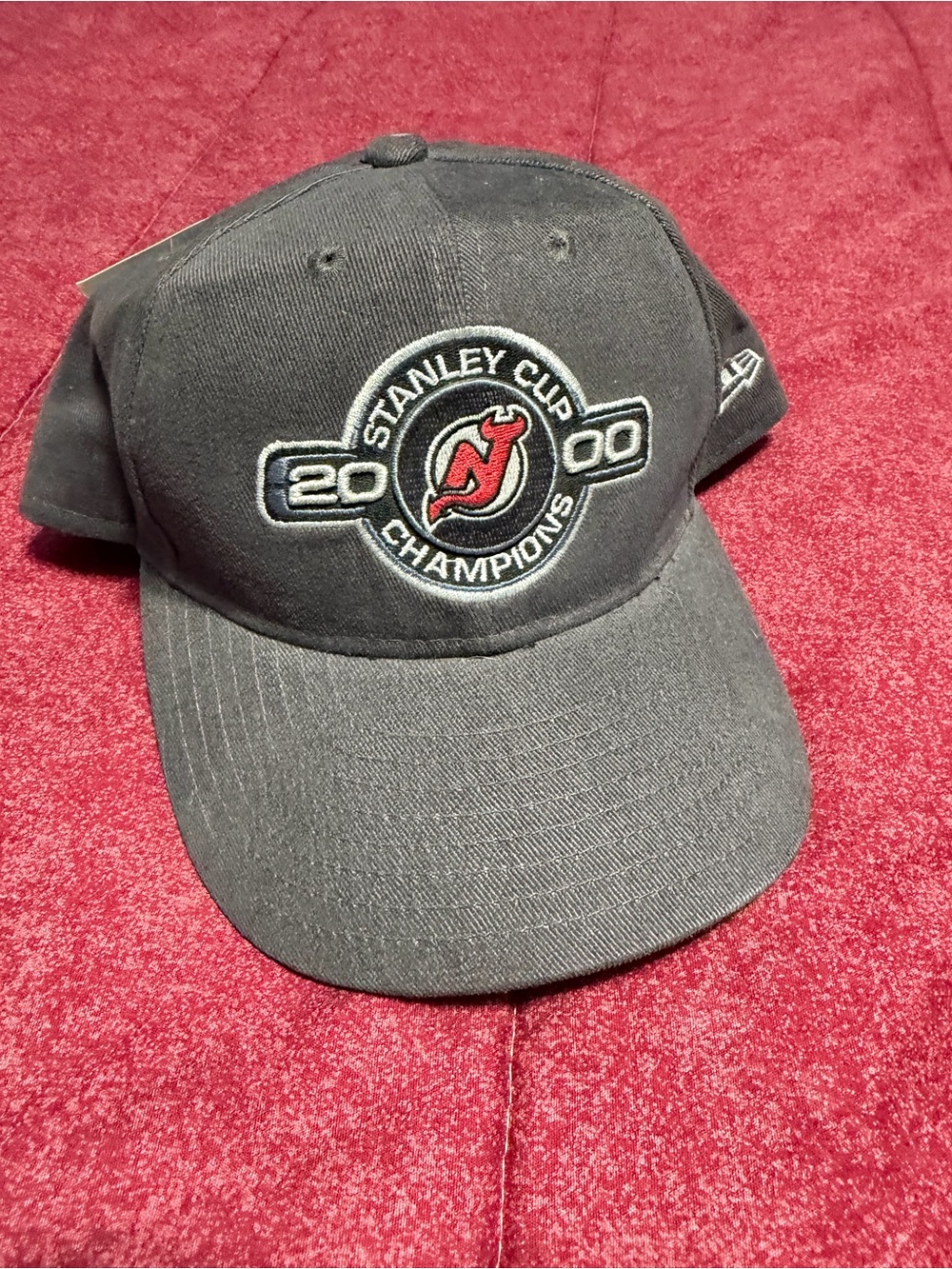 NHL Gray Baseball Cap with Orange Logo Tag